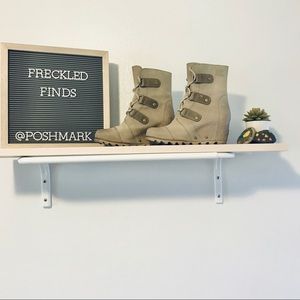 Sorel 2 1/2 inch Joan of arctic heeled boots.